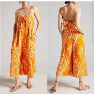 Anthropologie darling orange jumpsuit. So cute!